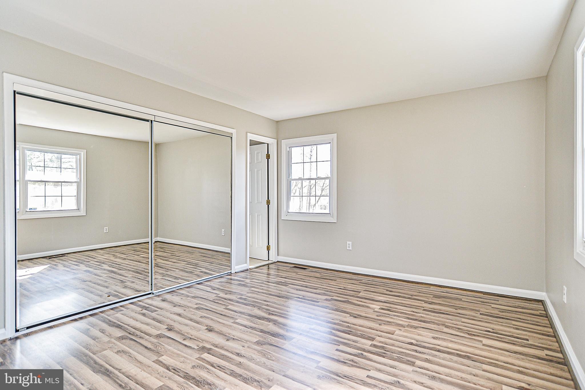 8906 Churchfield Lane Laurel, MD 20708 - Photo 23 of 32 Master bedroom with Ensuite Bath