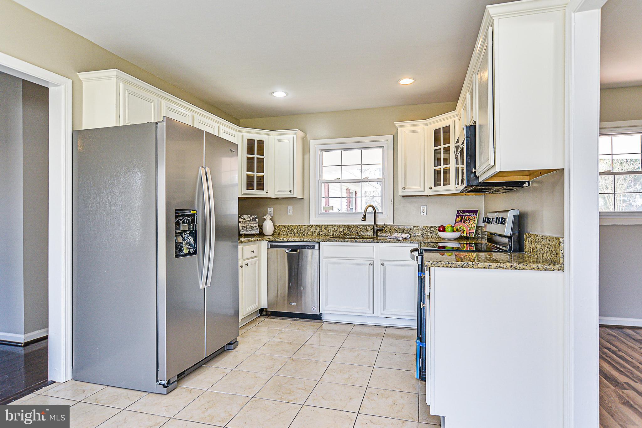 8906 Churchfield Lane Laurel, MD 20708 - Photo 5 of 32 granite counter tops & stainless steel appliances