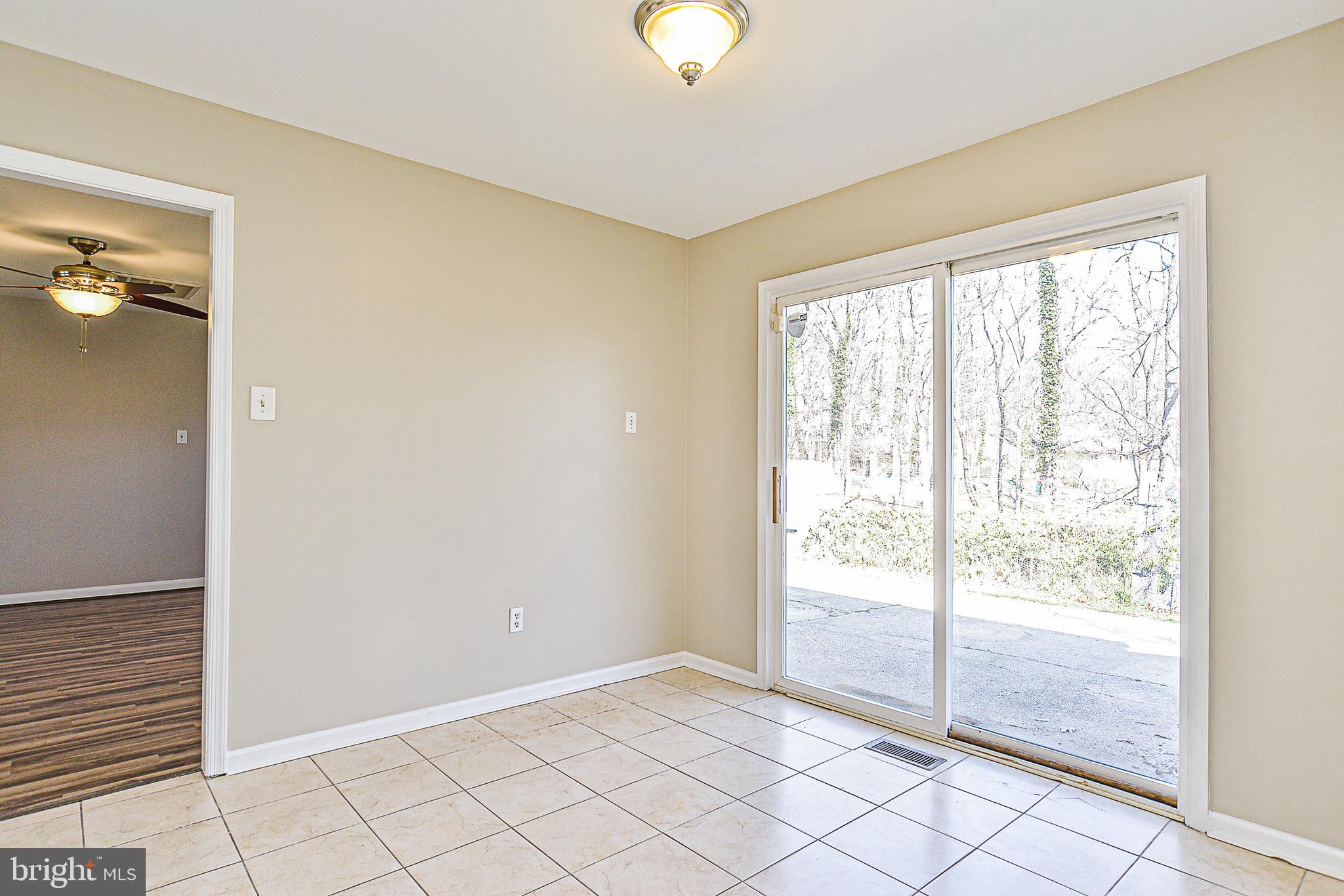 8906 Churchfield Lane Laurel, MD 20708 - Photo 7 of 32 Breakfast area opens to patio & rear yard
