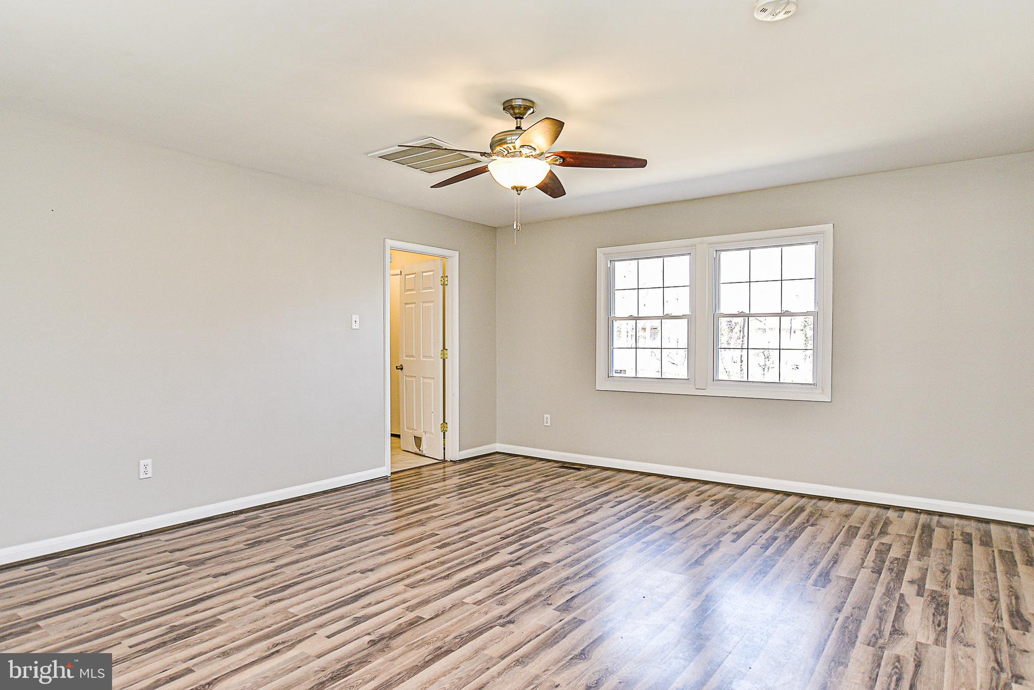 8906 Churchfield Lane Laurel, MD 20708 - Photo 8 of 32 Large family room off kitchen
