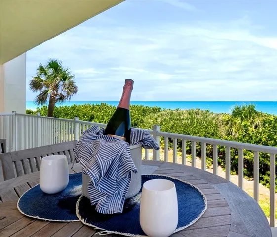 a view of balcony with furniture
