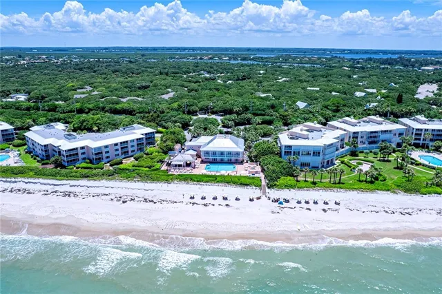 a view of a street with a garden