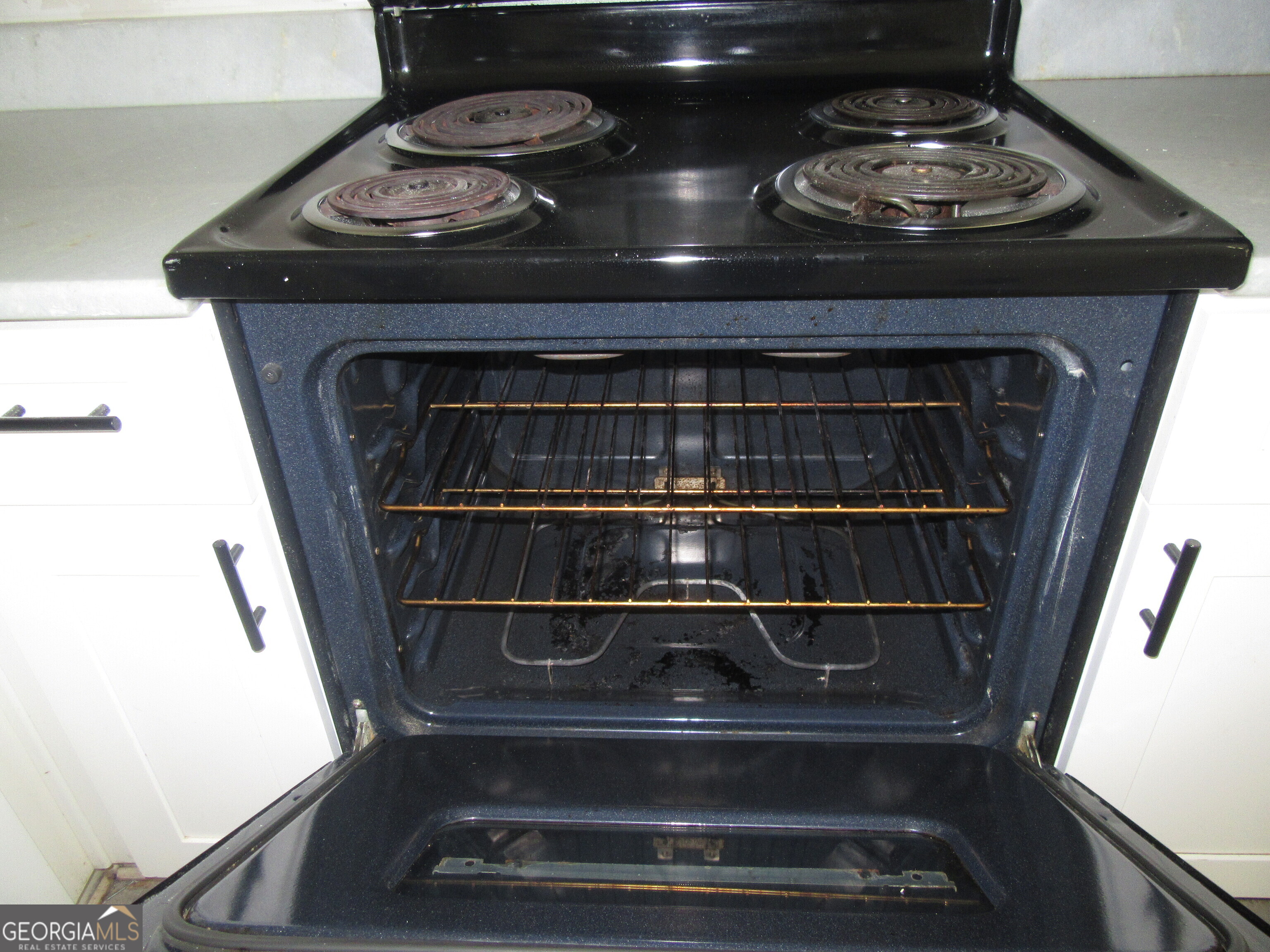 3548 Waldrop Trail Decatur, GA 30034 - Photo 12 of 38 a stove top oven sitting inside of a kitchen