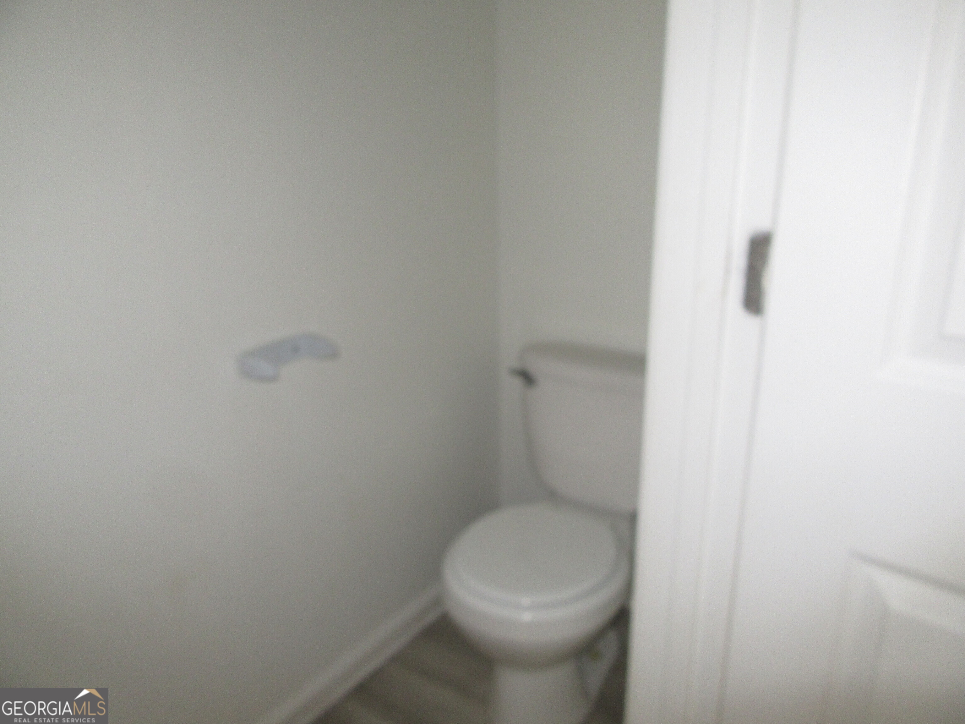 3548 Waldrop Trail Decatur, GA 30034 - Photo 19 of 38 a white toilet sitting next to a white wall