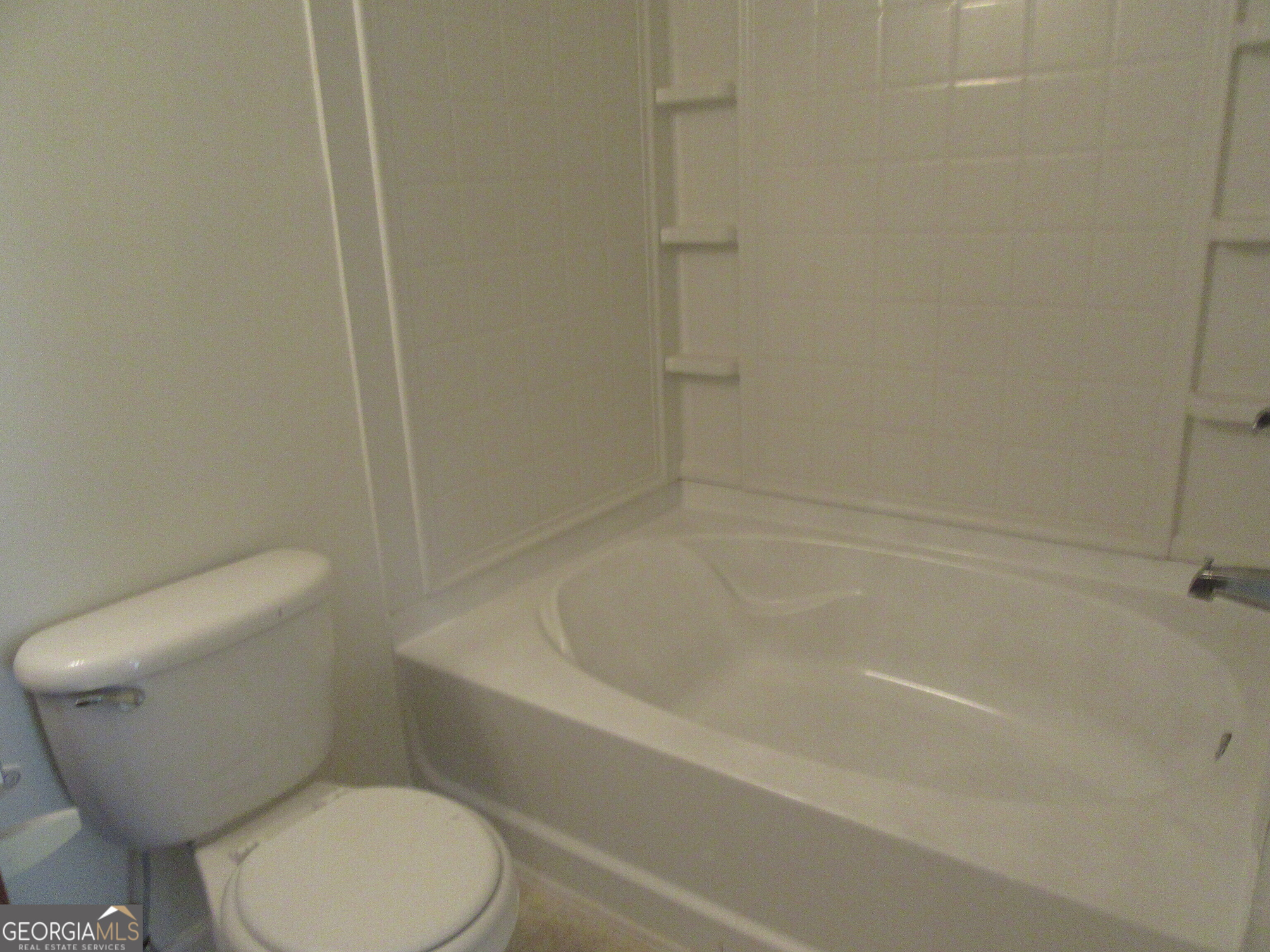 3548 Waldrop Trail Decatur, GA 30034 - Photo 28 of 38 a white toilet sitting next to a bath tub