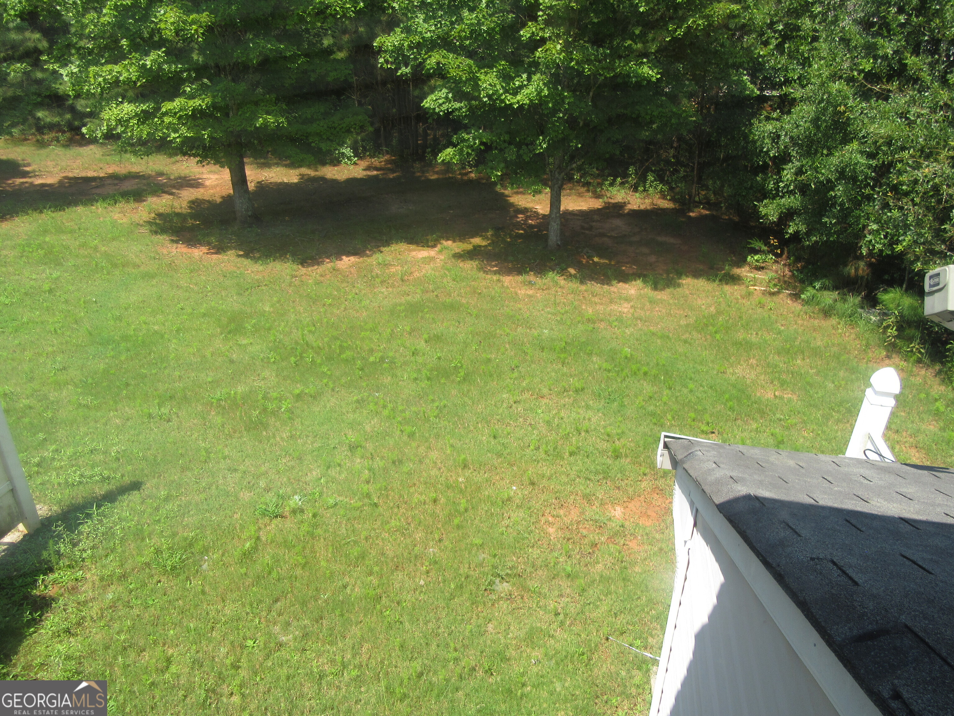 3548 Waldrop Trail Decatur, GA 30034 - Photo 37 of 38 a view of a lake from a yard