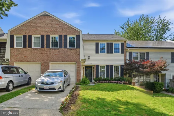 a car parked in front of a house