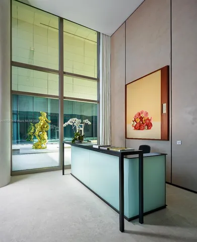 a view of storage and utility room with a window