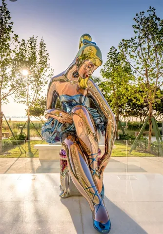 a view of entryway room and hall with wooden floor