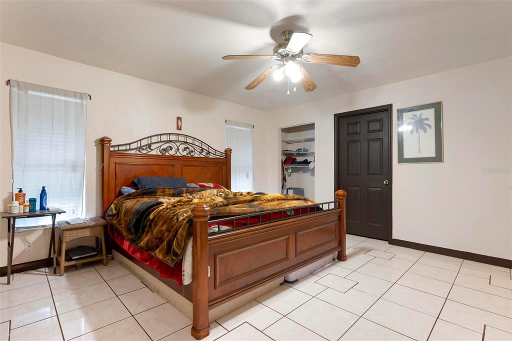 3092 Golfview Drive Wauchula, FL 33873 - Photo 23 of 41 a bed sitting in a bedroom and night stand