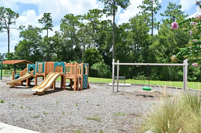 a view of park with swings