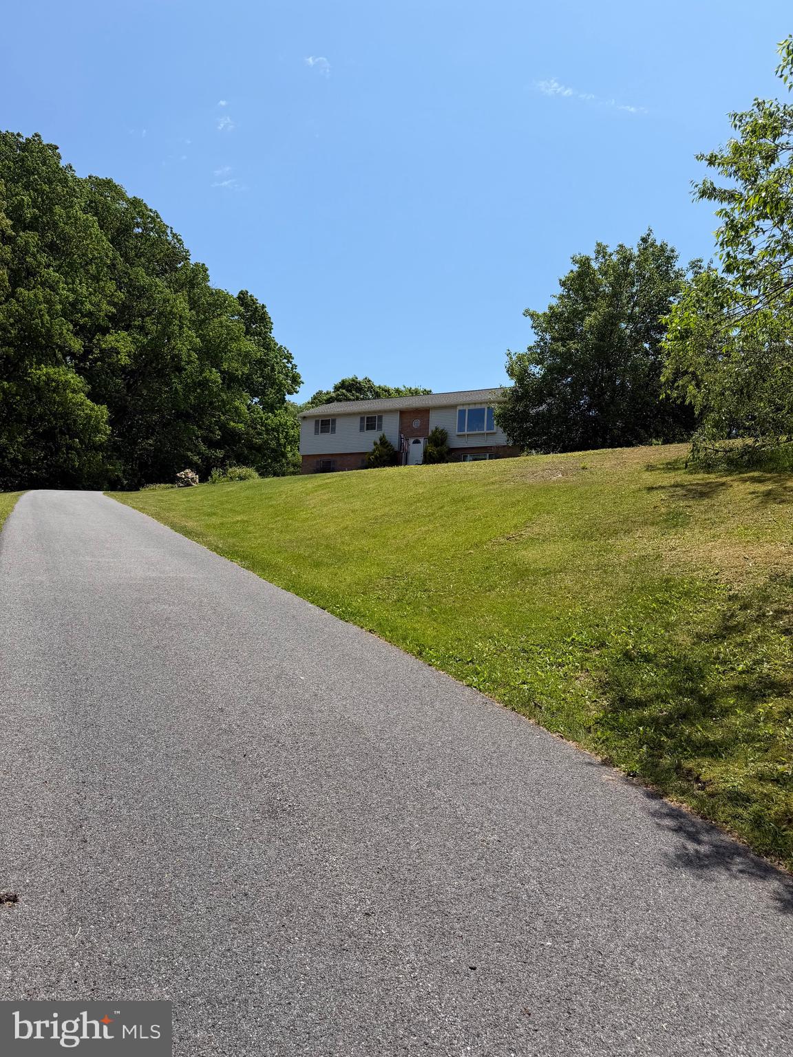 37 Beavens Road Reading, PA 19608 - Photo 2 of 7 a view of a field with an ocean