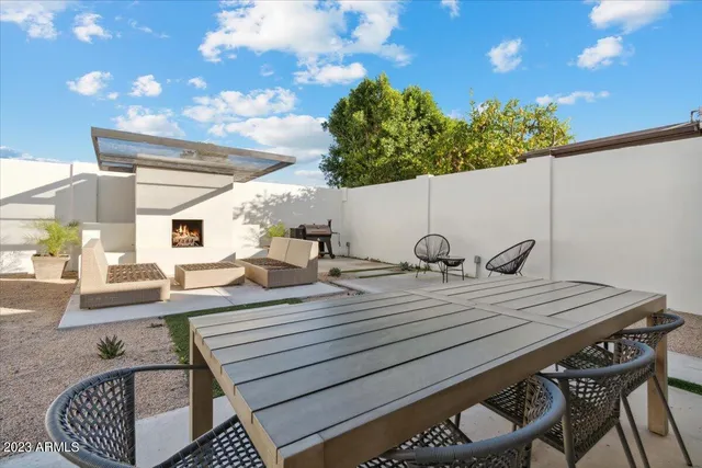 a view of a balcony dining area