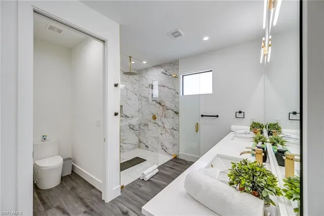 a spacious bathroom with a shower