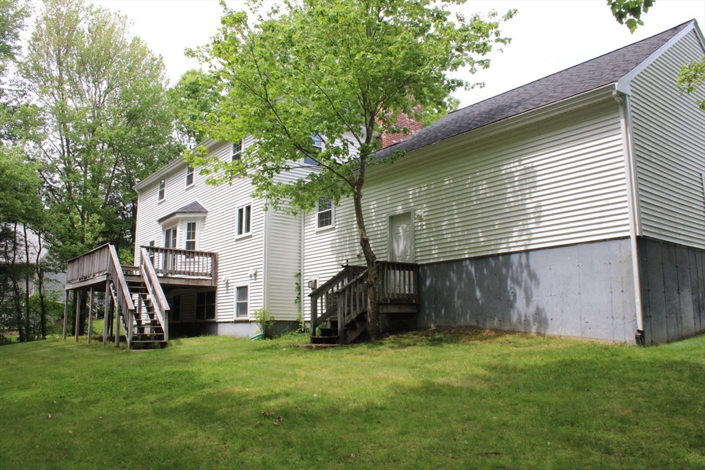 27 Gretchen Way Raynham, MA 02767 - Photo 16 of 20 a view of a house with backyard
