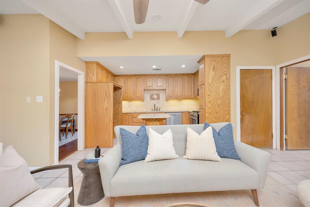 1761 Cynthia Lane Hurst, TX 76054 - Photo 18 of 40 a large bedroom with a large bed and a couch