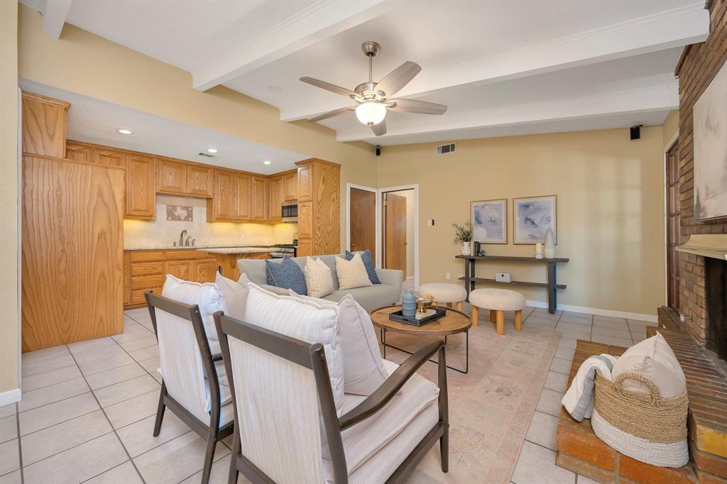 1761 Cynthia Lane Hurst, TX 76054 - Photo 19 of 40 a living room with furniture and kitchen view