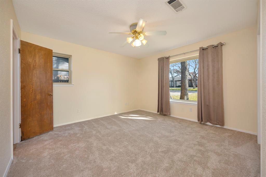 1761 Cynthia Lane Hurst, TX 76054 - Photo 34 of 40 a view of an empty room with a window