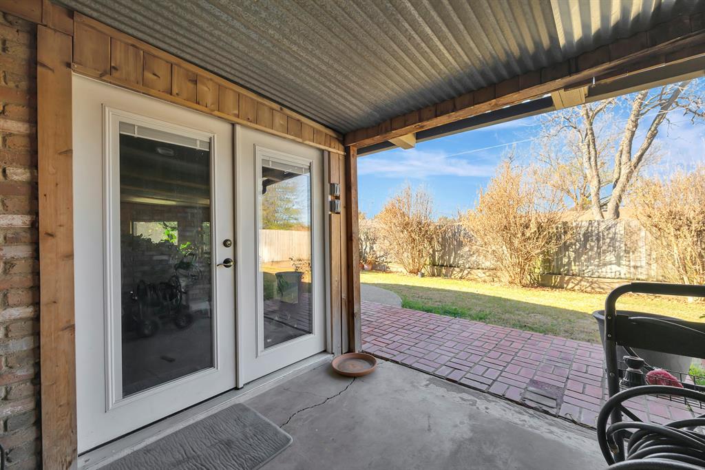 1761 Cynthia Lane Hurst, TX 76054 - Photo 35 of 40 a view of an outdoor space and porch