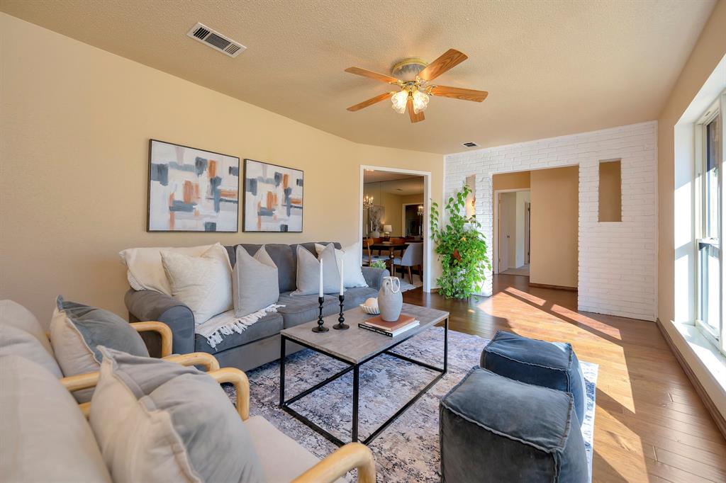 1761 Cynthia Lane Hurst, TX 76054 - Photo 5 of 40 a living room with furniture and a large window