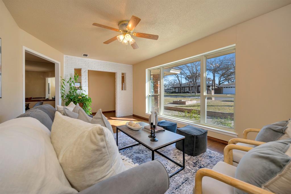 1761 Cynthia Lane Hurst, TX 76054 - Photo 7 of 40 a living room with furniture and a large window