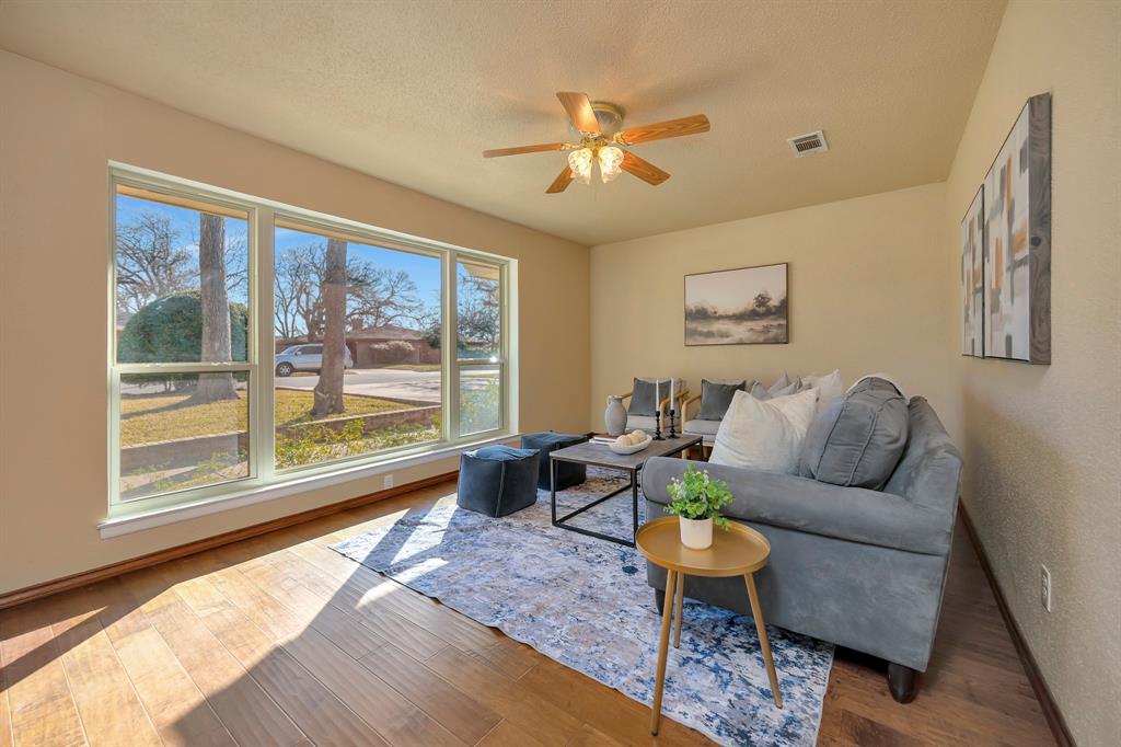1761 Cynthia Lane Hurst, TX 76054 - Photo 9 of 40 a living room with furniture and a large window