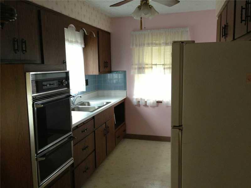 2420 Ridge Road Monaca, PA 15061 - Photo 2 of 15 Kitchen. Clean as a whistle! Galley type kitchen, lots of natural sunlight!