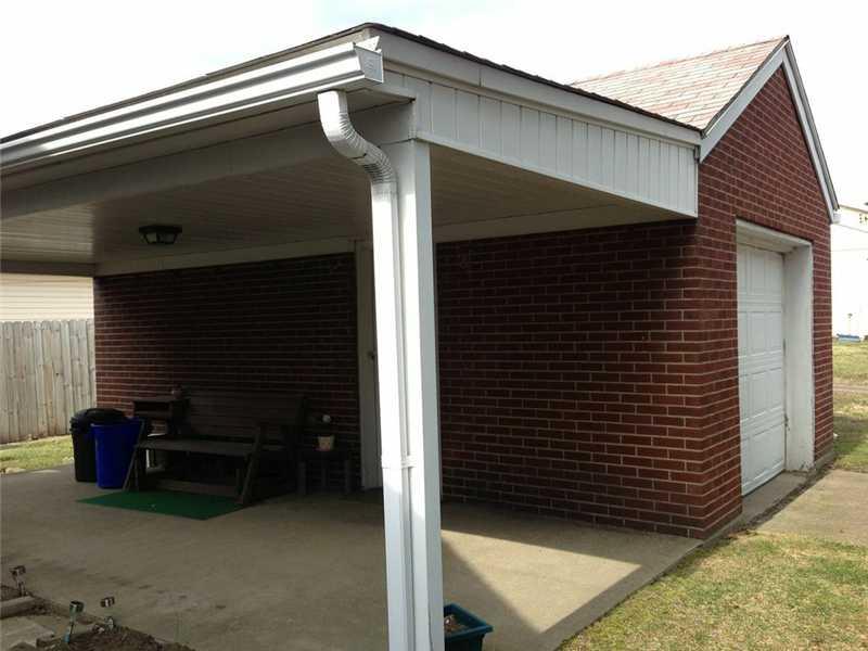 2420 Ridge Road Monaca, PA 15061 - Photo 13 of 15 Exterior Front. Covered Patio is steps away from kitchen door, and garage man door.