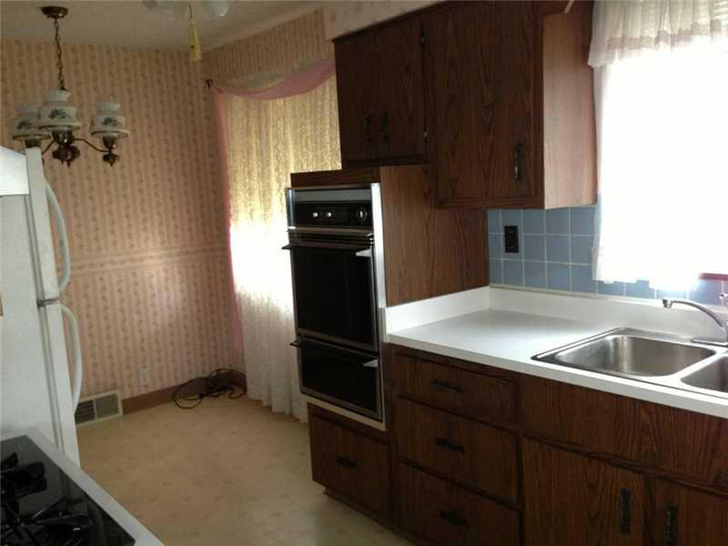 2420 Ridge Road Monaca, PA 15061 - Photo 3 of 15 Kitchen. Eat in kitchen, newer gas counter top stove.