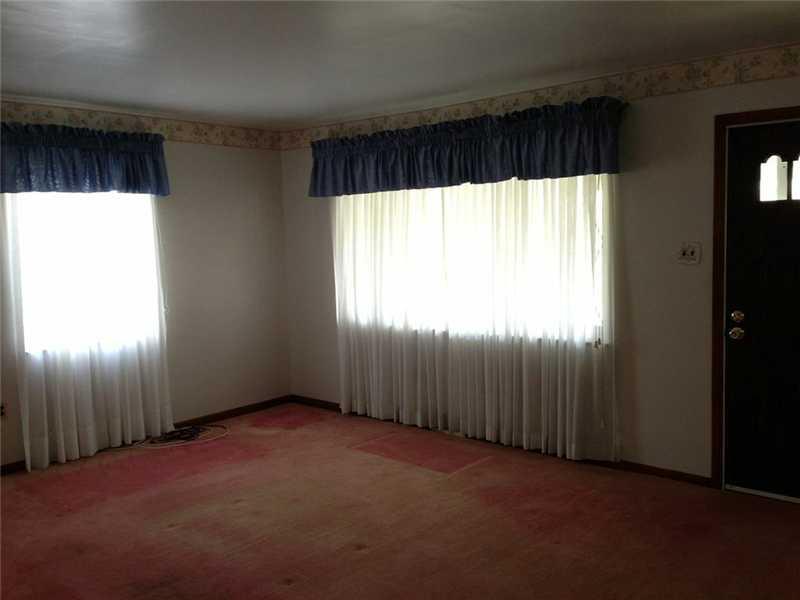 2420 Ridge Road Monaca, PA 15061 - Photo 4 of 15 Living Room. Two large windows, spacious living room.