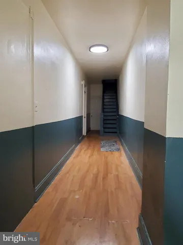 an empty room with a gallery