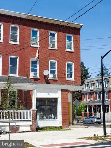 a front view of a building with street view