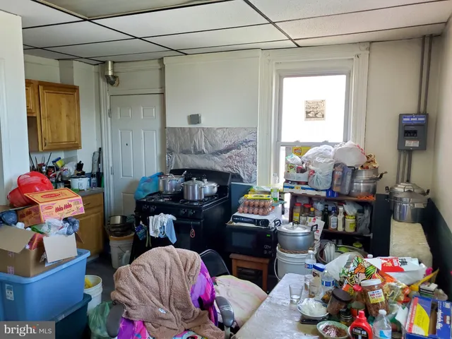 a living room filled with furniture and a couch