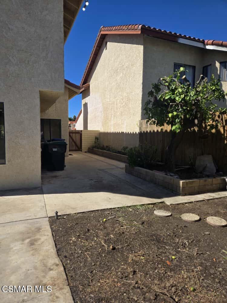 6492 Melray Street Moorpark, CA 93021 - Photo 30 of 59 a view of a house with a yard