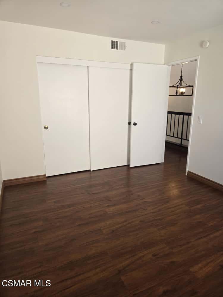6492 Melray Street Moorpark, CA 93021 - Photo 36 of 59 a view of a room with wooden floor