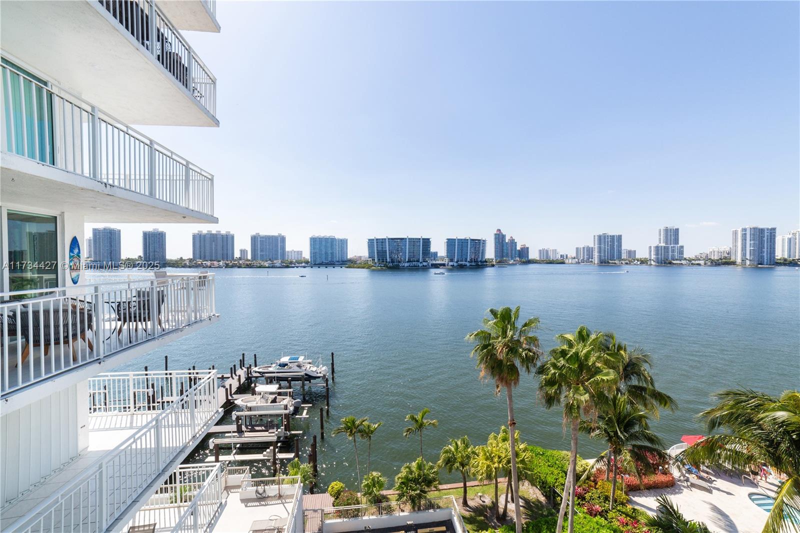 18000 North Bay Road, Unit 602 Sunny Isles Beach, FL 33160 - Photo 8 of 40 a view of a lake with tall building