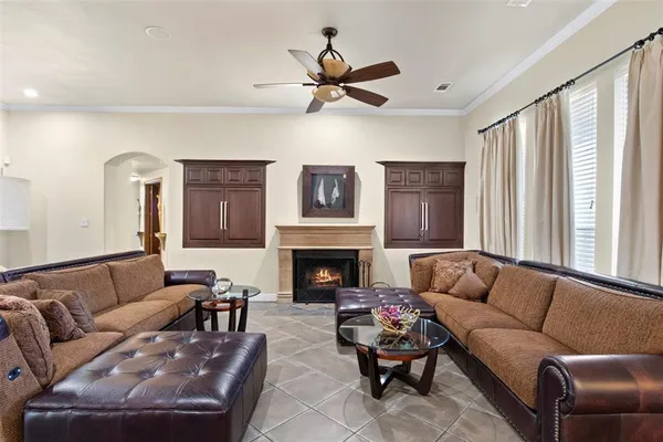 a kitchen with stainless steel appliances granite countertop a sink refrigerator and cabinets