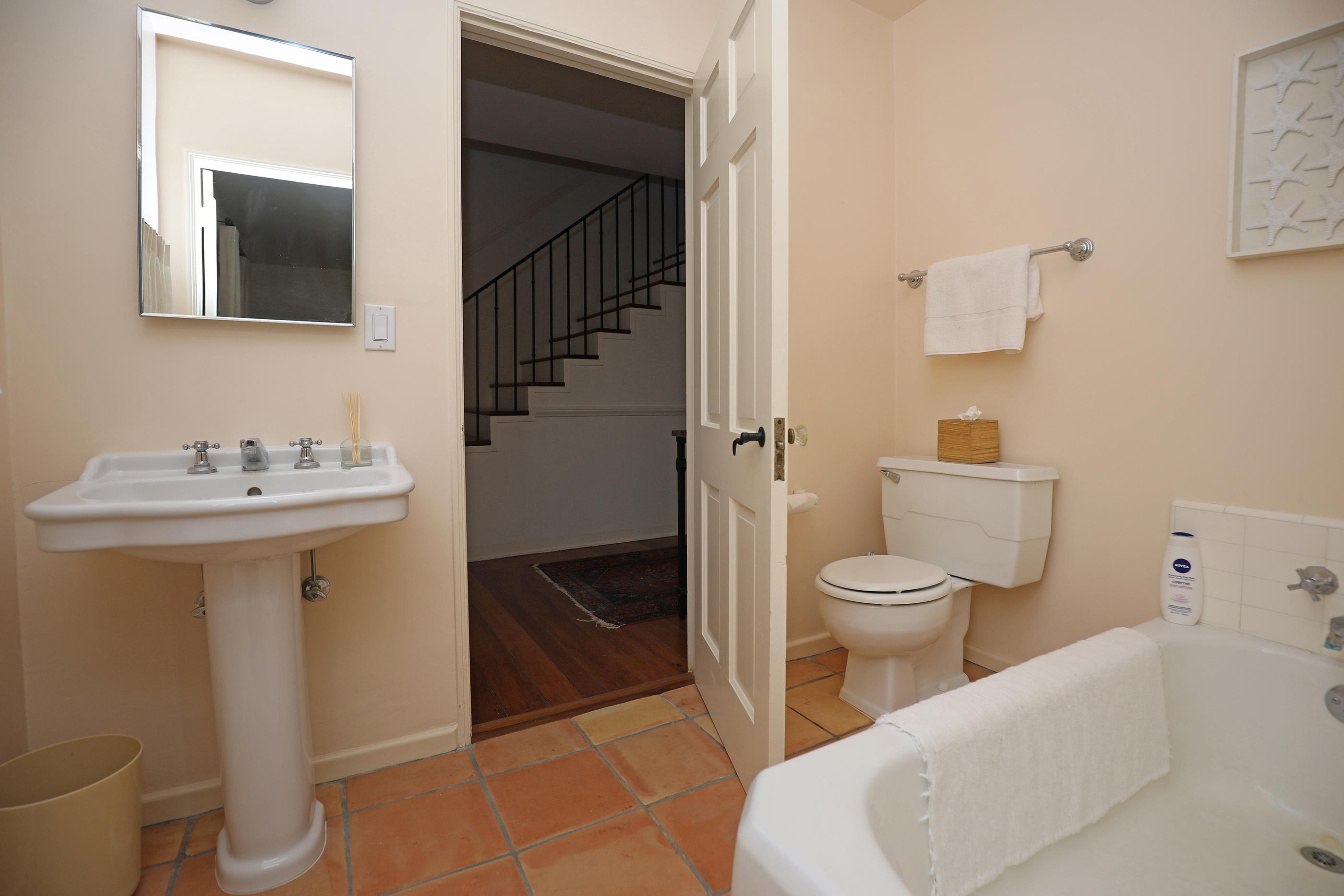 71 Hollister Ranch Road Lompoc, CA 93436 - Photo 15 of 31 a bathroom with a toilet sink and mirror