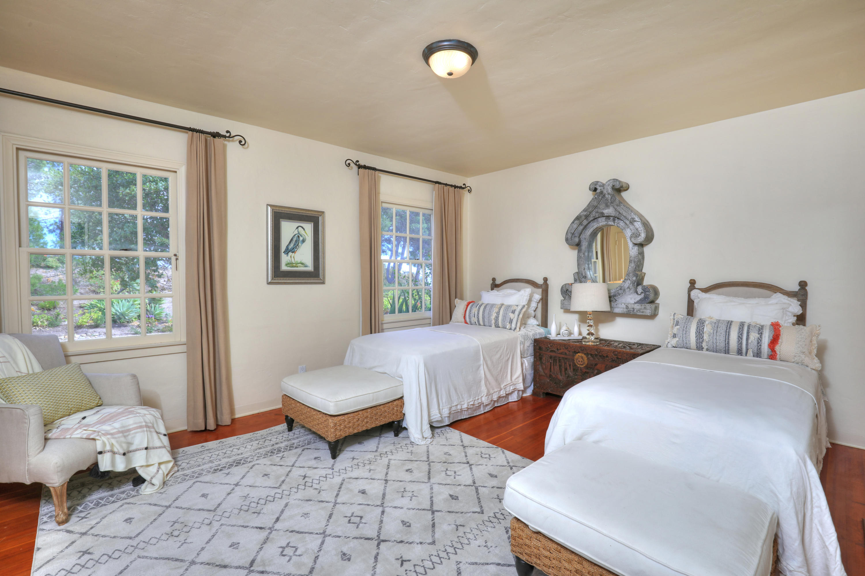 71 Hollister Ranch Road Lompoc, CA 93436 - Photo 16 of 31 a bedroom with two beds and a window