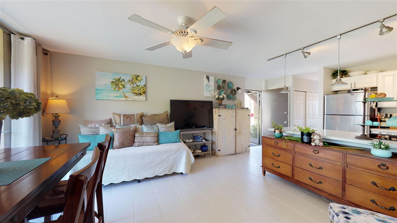 120 Hui Rd F, Unit H4 Lahaina, HI 96761 - Photo 18 of 21 a living room with furniture and a flat screen tv