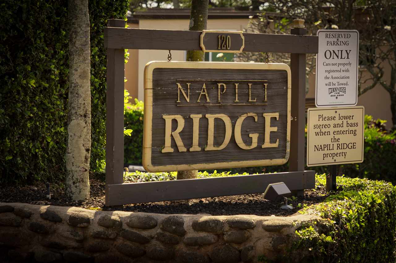 120 Hui Rd F, Unit H4 Lahaina, HI 96761 - Photo 19 of 21 a sign on the wall of building