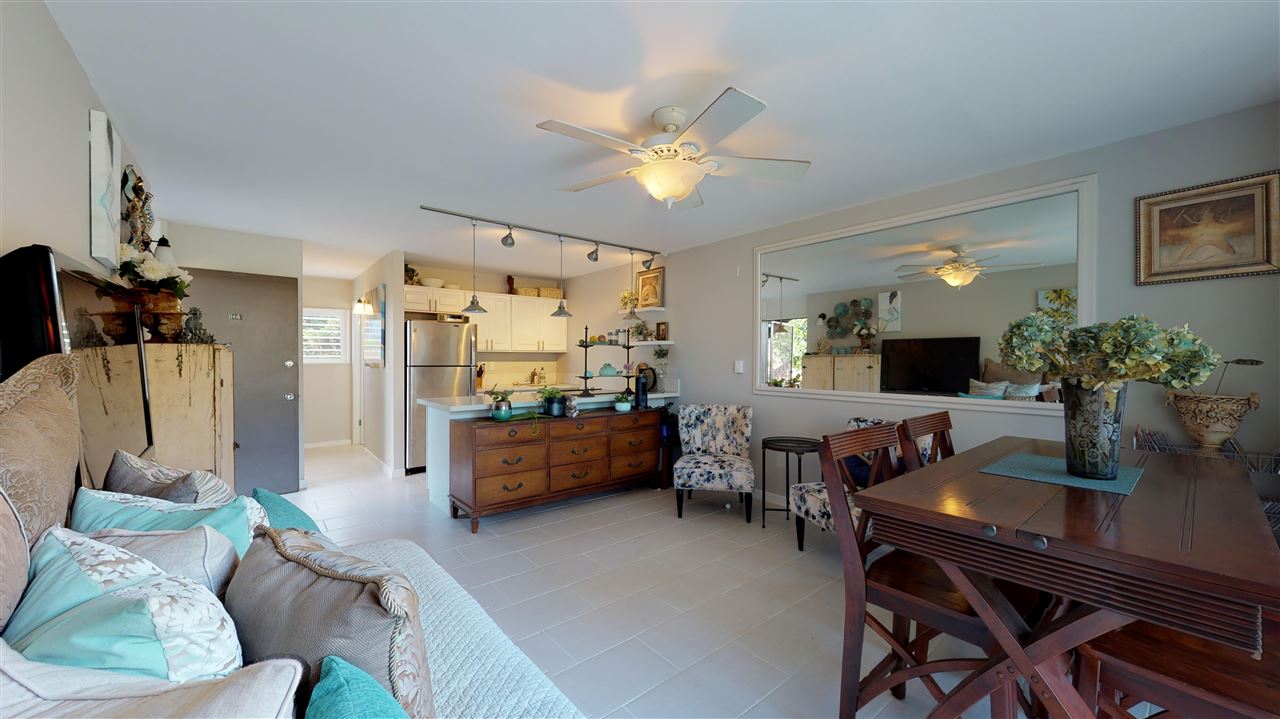 120 Hui Rd F, Unit H4 Lahaina, HI 96761 - Photo 2 of 21 a living room with furniture kitchen view and a chandelier
