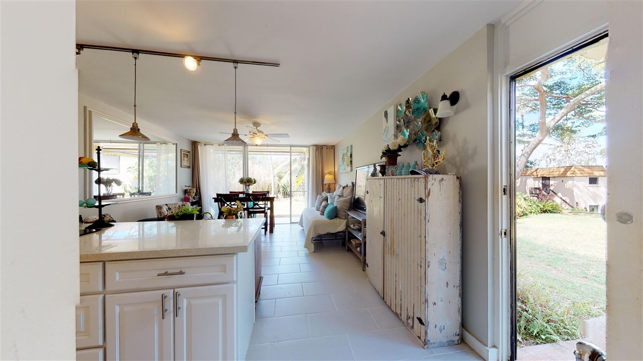 120 Hui Rd F, Unit H4 Lahaina, HI 96761 - Photo 3 of 21 a kitchen with a refrigerator a stove and a sink