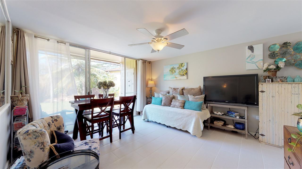 120 Hui Rd F, Unit H4 Lahaina, HI 96761 - Photo 4 of 21 a living room with furniture and a flat screen tv