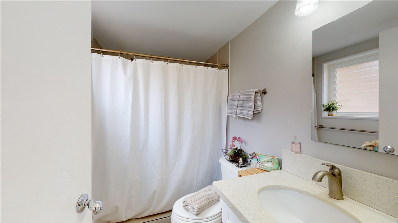 120 Hui Rd F, Unit H4 Lahaina, HI 96761 - Photo 7 of 21 a bathroom with a sink toilet and shower
