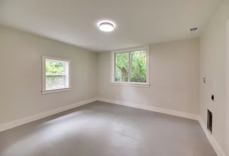 an empty room with windows