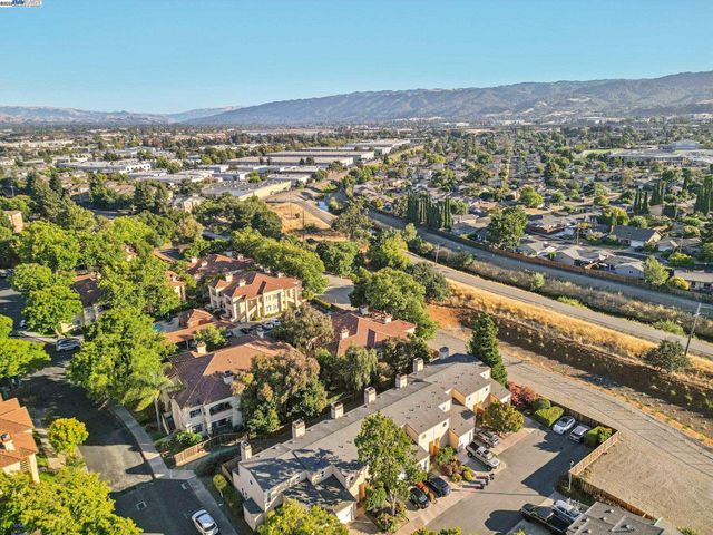 an aerial view of residential building with parking space