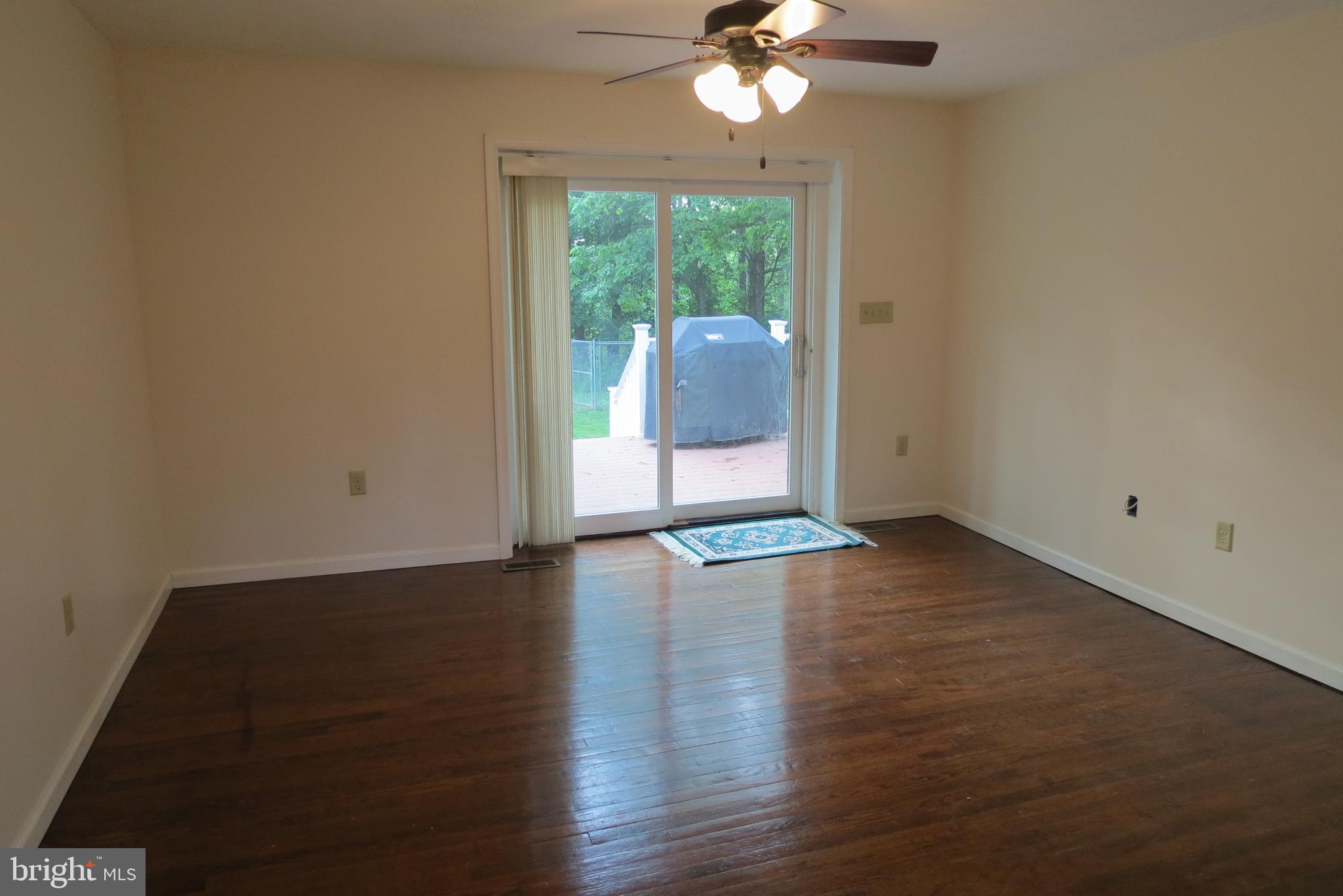 4822 Ridge Road Mount Airy, MD 21771 - Photo 17 of 38 Dining room with ceiling fan HW floors