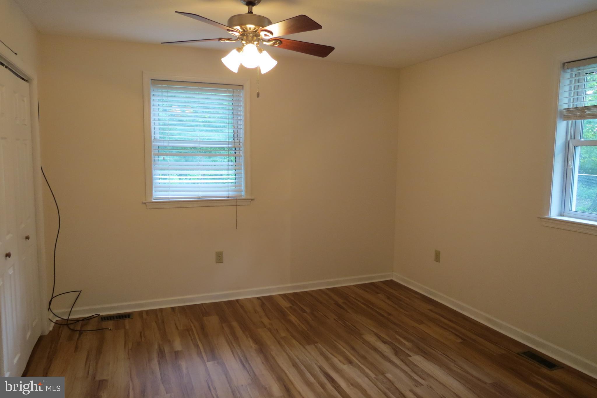 4822 Ridge Road Mount Airy, MD 21771 - Photo 19 of 38 Owner's BR with Laminate floor & bath