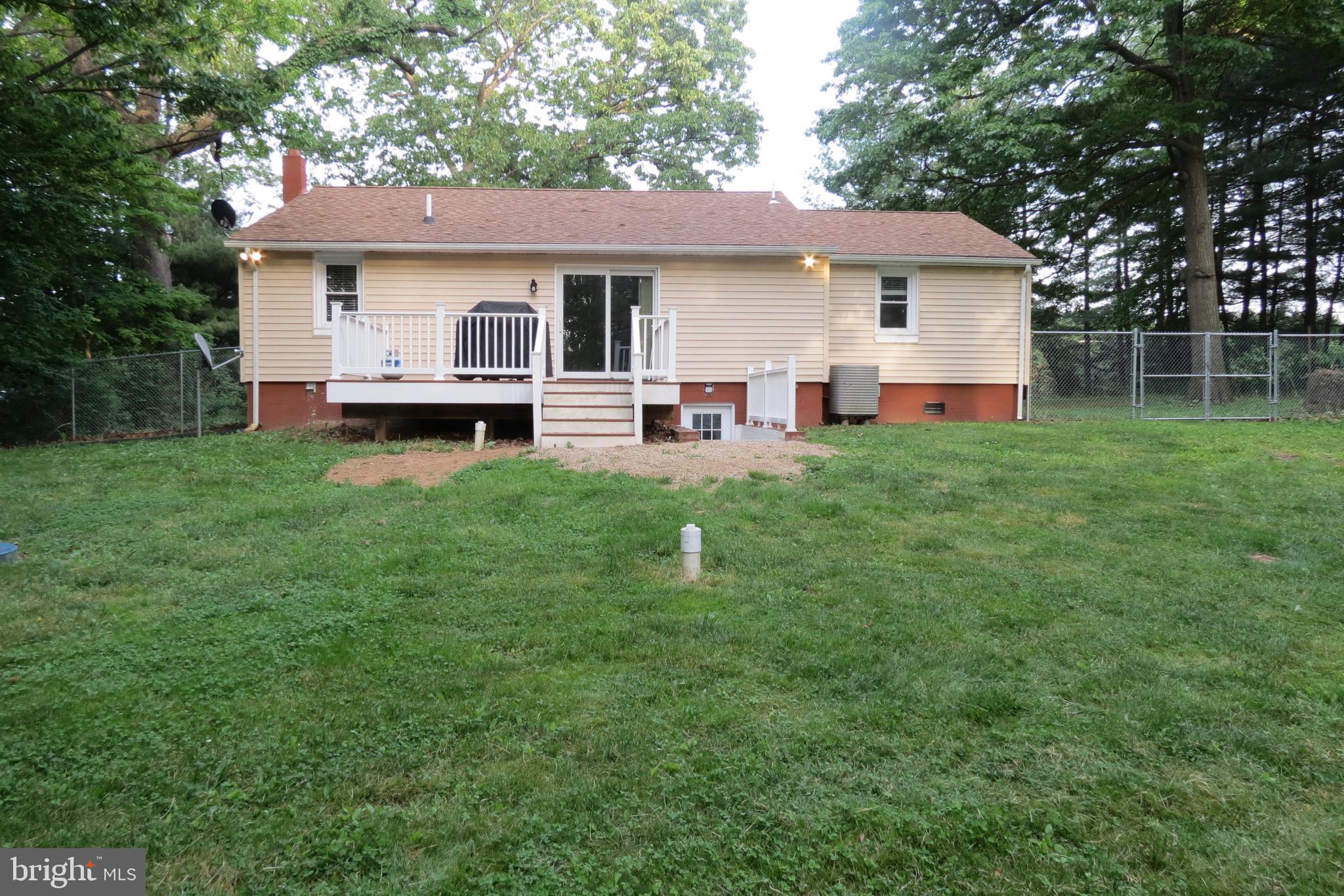 4822 Ridge Road Mount Airy, MD 21771 - Photo 6 of 38 Rear view of deck and basement exit